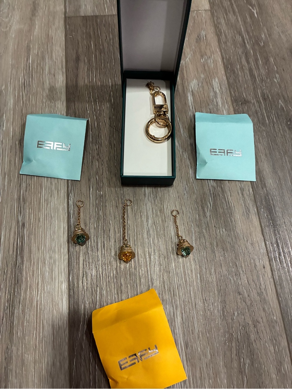 Effy Golden Keyring with Blue and Amber Bell Charms